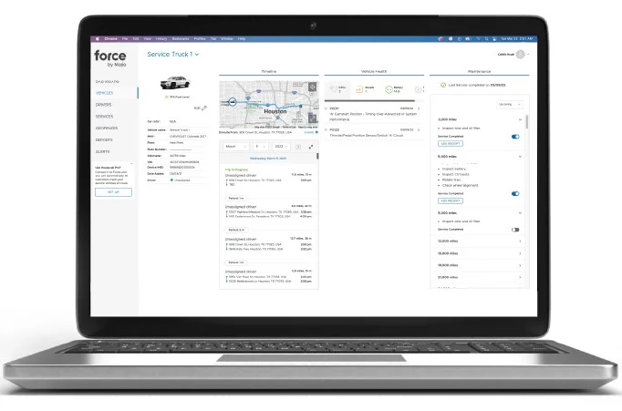 Housecall Pro & Mojio performance dashboard on laptop